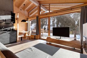 TV a/nebo společenská místnost v ubytování Chalet Berg