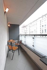 Un balcón o terraza de Warsaw City Apartments
