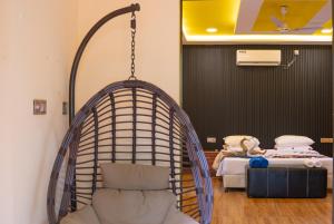 a room with a swing and a bed at Nika Inn Himandhoo in Himandhoo  +66 photos