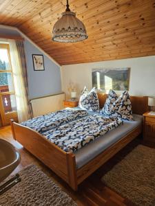 Voodi või voodid majutusasutuse Biohof Poinsitgut toas