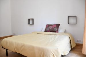 Postel nebo postele na pokoji v ubytování Martello Apartments