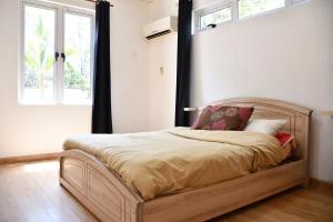 Postel nebo postele na pokoji v ubytování Martello Apartments + 22 fotografií