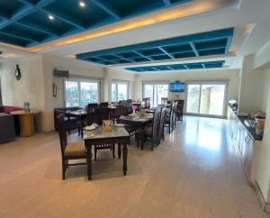 Εστιατόριο ή άλλο μέρος για φαγητό στο Luxury Inn by Stotrak Hotels