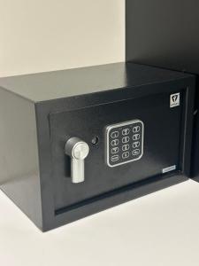 a black box with a safe on a table at הפנינה השחורה in Mitzpe Ramon