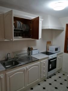 Kuchyňa alebo kuchynka v ubytovaní Maritima Beach apartamento