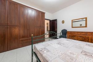 Posteľ alebo postele v izbe v ubytovaní Residenza Gabry