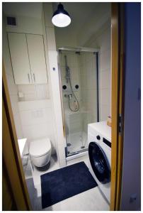 Ένα μπάνιο στο Color Apartament Przytulny Kąt