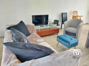 Χώρος καθιστικού στο L'Auberge Neuve