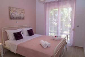 Voodi või voodid majutusasutuse Filerimos City Center Apt in Ialysos Rhodes toas