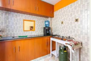 Una cocina o cocineta en Aoukings Home