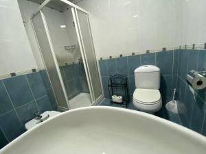 Koupelna v ubytování Mareas vivas + 8 fotografií