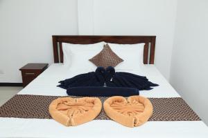Voodi või voodid majutusasutuse Crystal Wave Holiday Resort Polhena toas