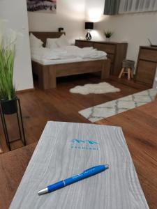 Postel nebo postele na pokoji v ubytování Horský apartmán v resortu se službami a wellness