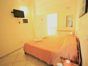 TV a/nebo společenská místnost v ubytování B&B Arcobaleno - Costa
