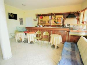 Kuchyň nebo kuchyňský kout v ubytování B&B Arcobaleno - Costa