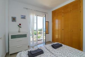 A bed or beds in a room at Casa Bella Vista