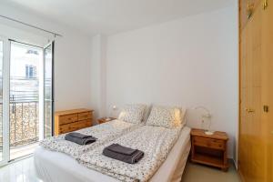 A bed or beds in a room at Casa Bella Vista