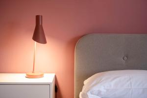 Posteľ alebo postele v izbe v ubytovaní Casapiu Rooms