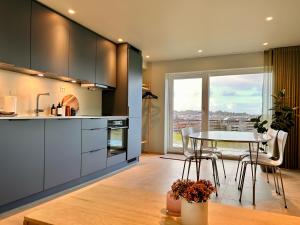 Kuchyň nebo kuchyňský kout v ubytování Apartment with garden and sea view + 8 fotografií