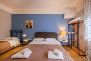 Posteľ alebo postele v izbe v ubytovaní Casapiu Rooms