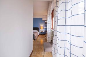 Posteľ alebo postele v izbe v ubytovaní Casapiu Rooms