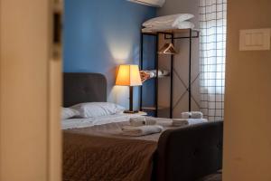Posteľ alebo postele v izbe v ubytovaní Casapiu Rooms