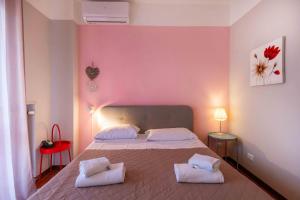 Posteľ alebo postele v izbe v ubytovaní Casapiu Rooms