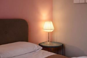 Posteľ alebo postele v izbe v ubytovaní Casapiu Rooms
