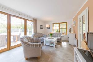 Posezení v ubytování Ferienhaus Dierhagen am Deich