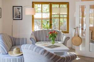 Posezení v ubytování Ferienhaus Dierhagen am Deich