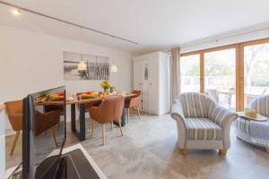 Posezení v ubytování Ferienhaus Dierhagen am Deich