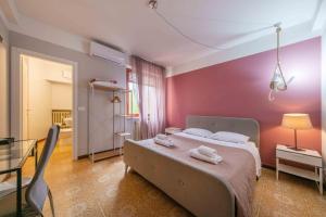 Posteľ alebo postele v izbe v ubytovaní Casapiu Rooms