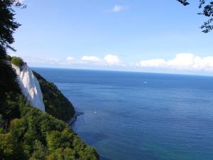 a view of the ocean from a cliff at Ferienhaus Sonnenschein in Breege in Juliusruh