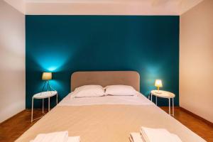 Posteľ alebo postele v izbe v ubytovaní Casapiu Rooms