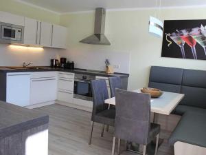 Kuchyň nebo kuchyňský kout v ubytování Ferienwohnung Suderende