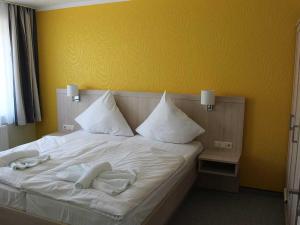 Postel nebo postele na pokoji v ubytování Ferienwohnung Suderende + 6 fotografií