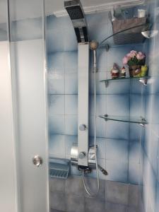 a bathroom with a shower with a glass door at Take me Home country home by "elite" in Éxo Khóra +41 photos