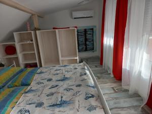 Posteľ alebo postele v izbe v ubytovaní Boathouse Balatonlelle with Sauna