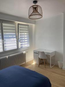 Ένα ή περισσότερα κρεβάτια σε δωμάτιο στο La Boissière