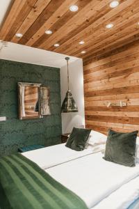 Postel nebo postele na pokoji v ubytování Havshotellet