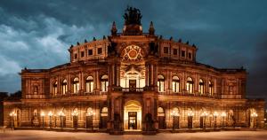 a large building with a statue on top of it at Sonniges Apartment Privatparkplatz Südterrasse in Dresden