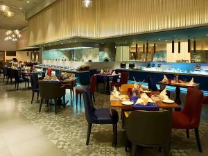 Grand Mercure Mysore - An Accor Brand餐厅或其他用餐的地方