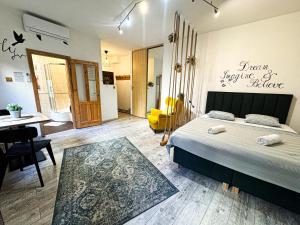 A bed or beds in a room at Beautiful Place in Slovakia Bratislava Old Town Center with AC