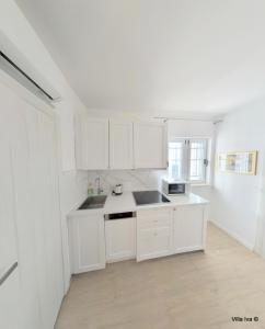 Kuchyň nebo kuchyňský kout v ubytování Apartments Iva
