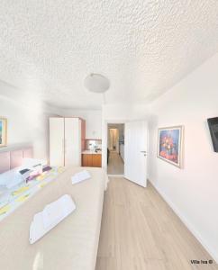 Postel nebo postele na pokoji v ubytování Apartments Iva