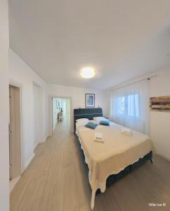 Postel nebo postele na pokoji v ubytování Apartments Iva