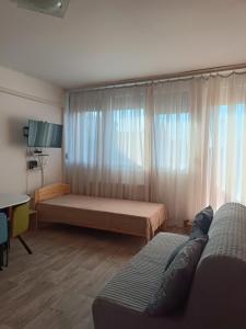 A television and/or entertainment centre at 100 lépés - 100 steps - Apt with huge terrace next to the thermal bath