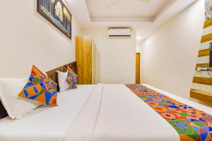 Postel nebo postele na pokoji v ubytování FabHotel Signor