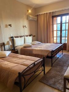 Krevet ili kreveti u jedinici u okviru objekta Olympic Hotel