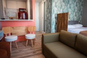 Postel nebo postele na pokoji v ubytování Seaside Escape at Luquillo Beach - Palma Luxe Studio